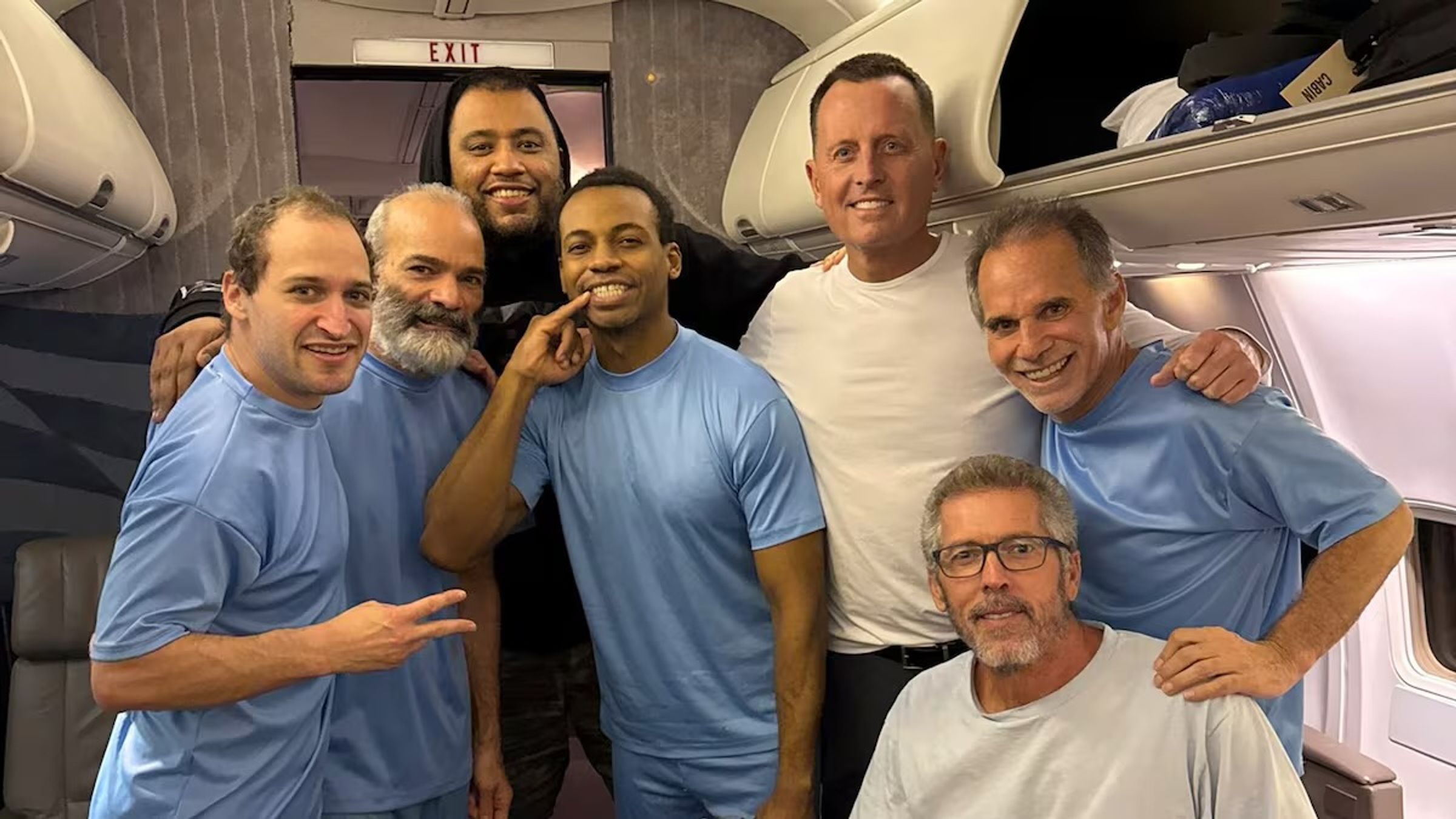 Trump’s special envoy Richard Grenell (third from right) and the Americans released from Venezuelan prisons