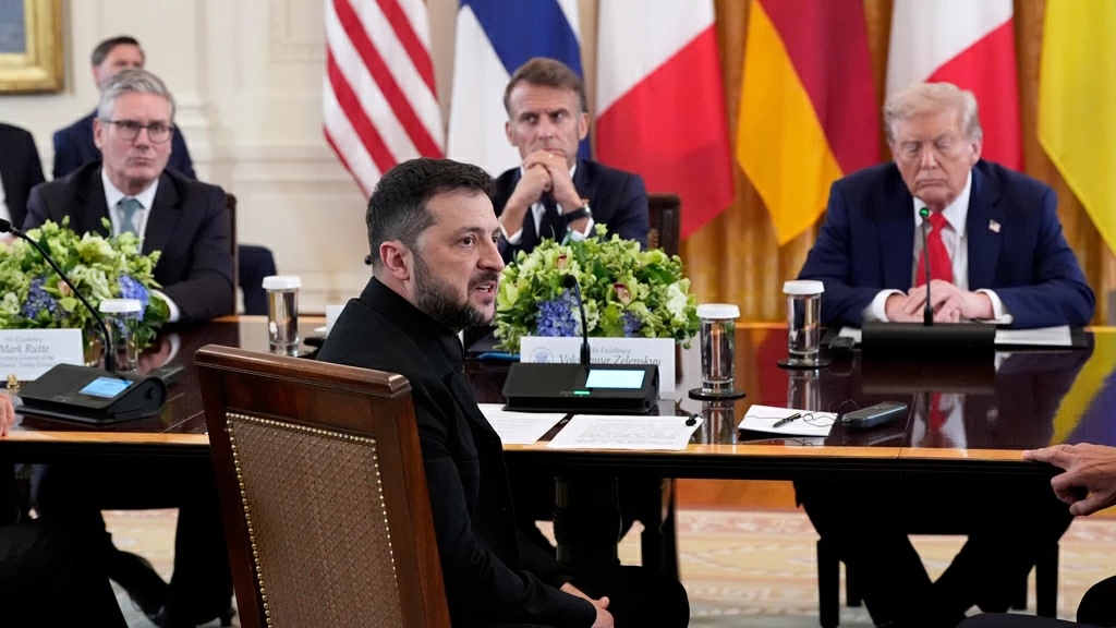 Ukraine’s President Volodymyr Zelensky speaks during a meeting in the East Room of the White House on Monday, Aug. 18, 2025, in Washington, as UK Prime Minister Keir Starmer, France’s President Emmanuel Macron and President Donald Trump listen in the background. Photo: Alex Brandon / AP Photo
